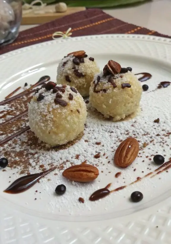 Un delizioso piatto di Tartufini al cocco e gocce di cioccolato